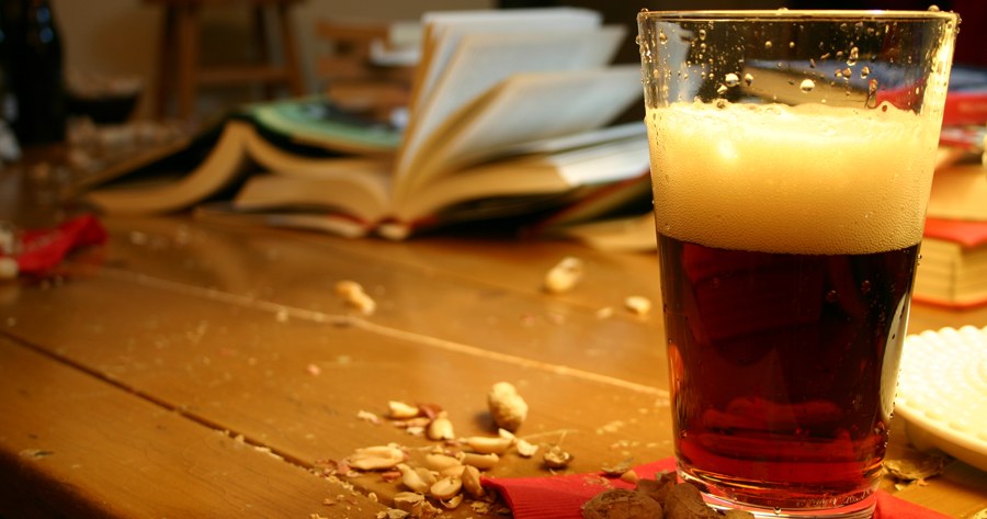 manuscript critique of books, with beer
